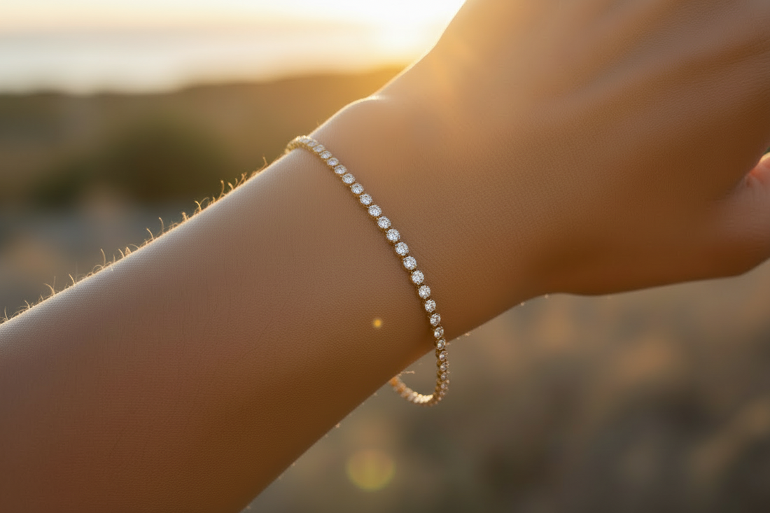 Close-up of a hand wearing a bracelet with a blurred natural background