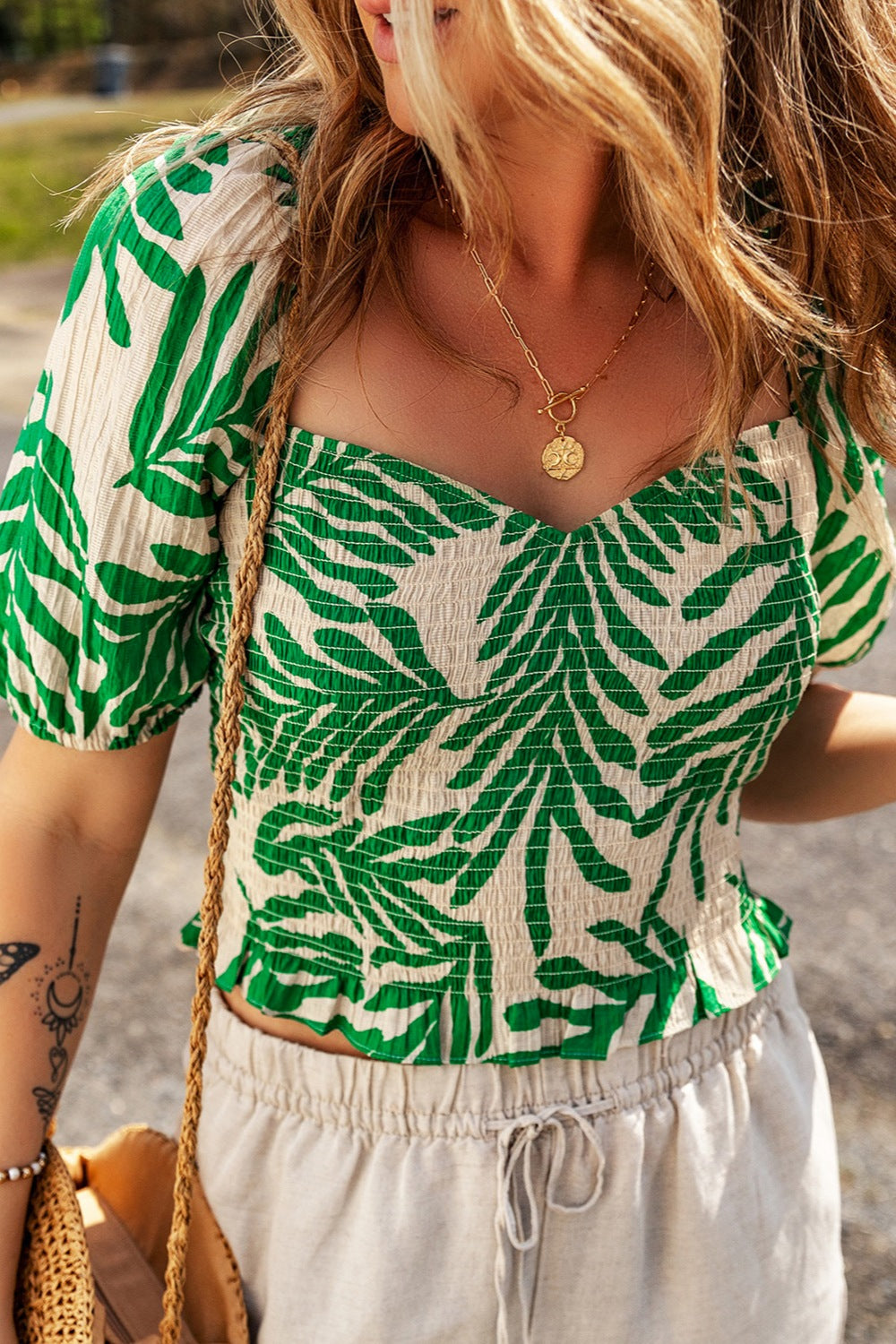 Chasing Waterfalls Smocked Printed Short Sleeve Blouse